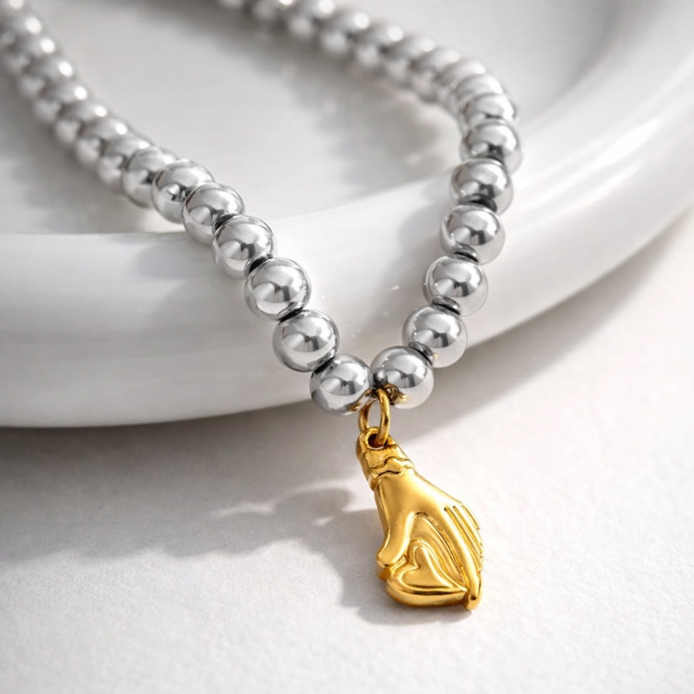 Heart in Hand Pendant Necklace